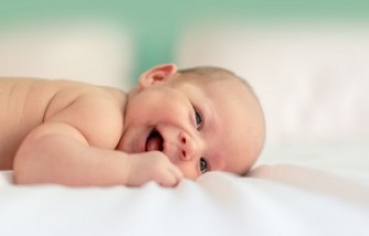 When Do Babies Roll Over? Experts Share Tips to Help Your Baby Start Sooner