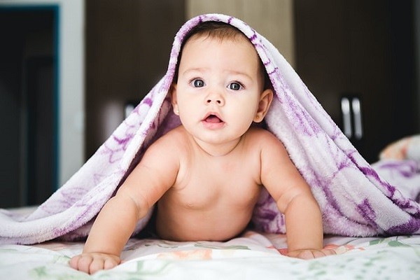 When Do Babies Sit Up? Tips on How to Help Your Baby