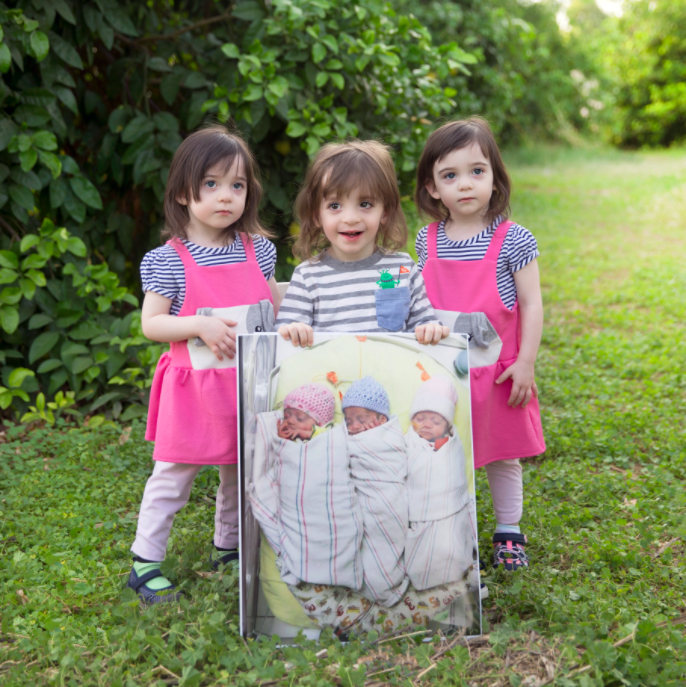 (From left to right) Eleanor Lewis, Henry Lewis and Abigail Lewis, all three years old