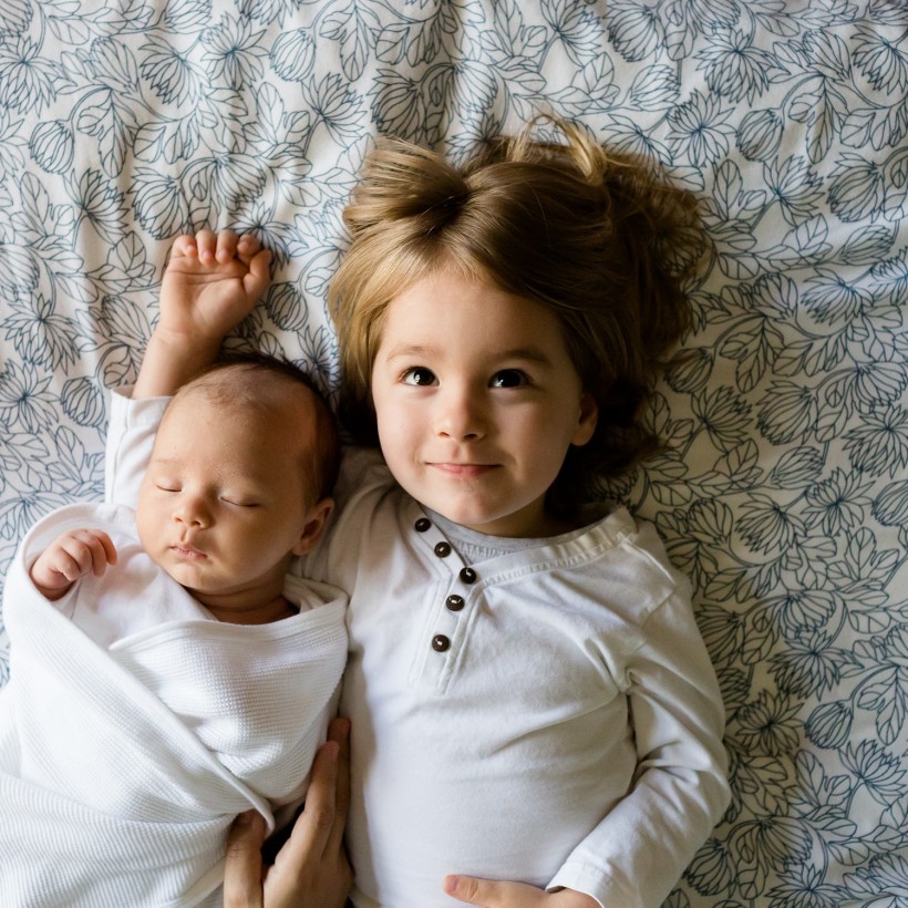 Welcoming a New Baby: How Do Siblings Affect Development?