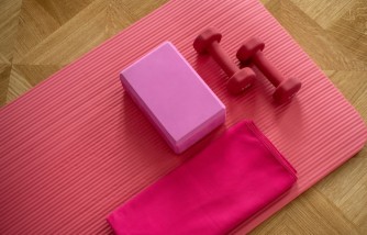 Dumbbells and a yoga mat are great equipment for a working from home exercise routine.
