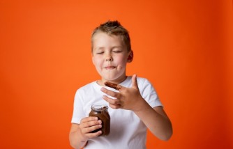 Too Much Screen Time Linked To Binge Eating in Children