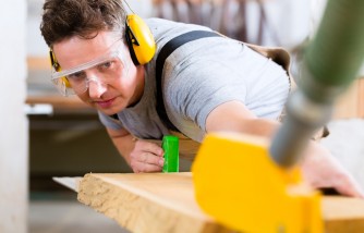 using saw with safety equipment