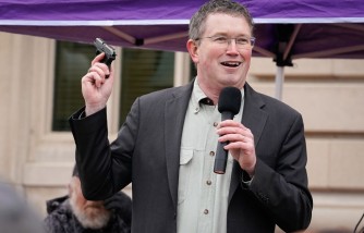 Fathers of School Shooting Victims Blast Rep. Thomas Massie for 'Nasty' Christmas Family Photo