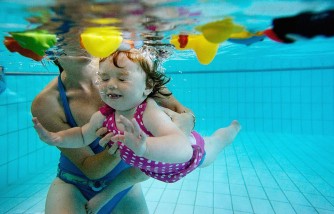 Your Kid's Swimsuit Color Matters, Water Safety Experts Say