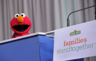 Red Muppet Elmo Gets COVID Vaccine in PSA to Encourage Jabs for Children Under the Age of 5