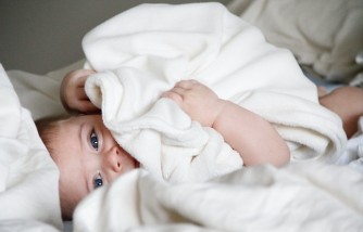 When Do Babies Stop Spitting Up: Understanding Your Baby’s Digestive Milestones