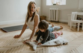 Mommy works out with toddler